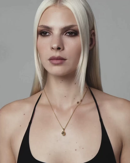 Cranium pendant necklace
