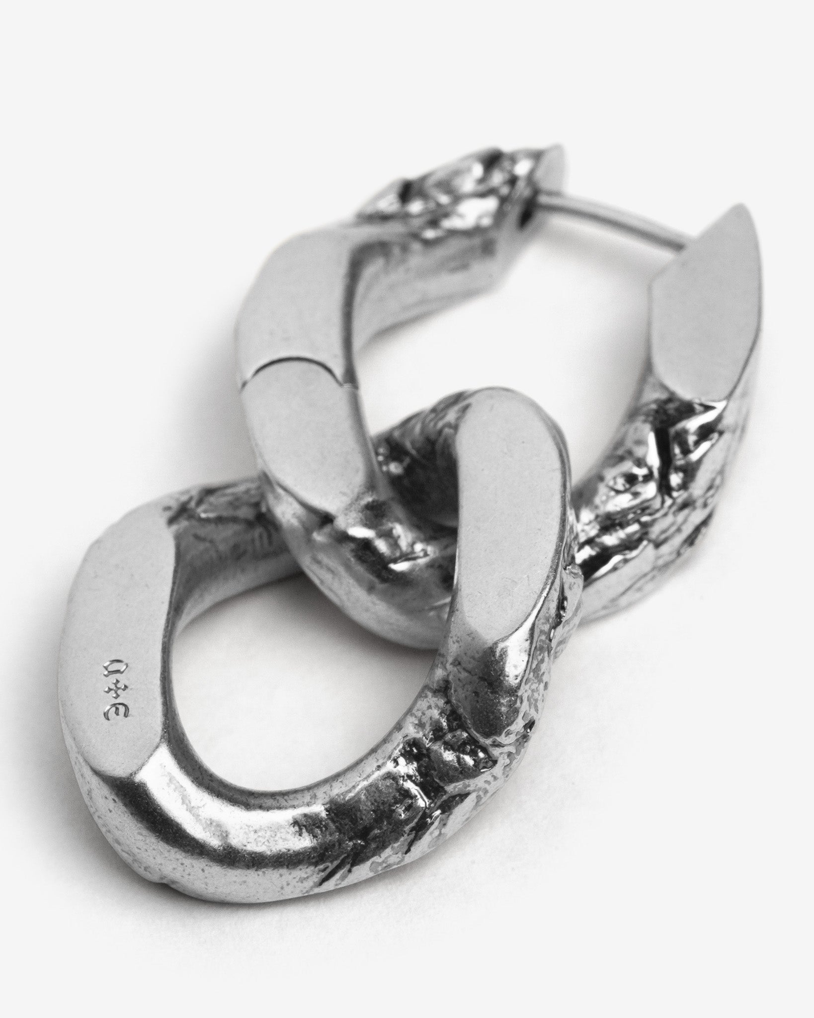 three curb chain links earrings in metal