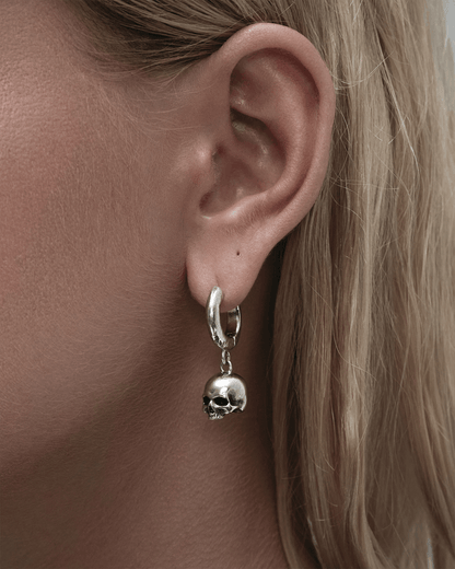 Cranium Huggie Earrings