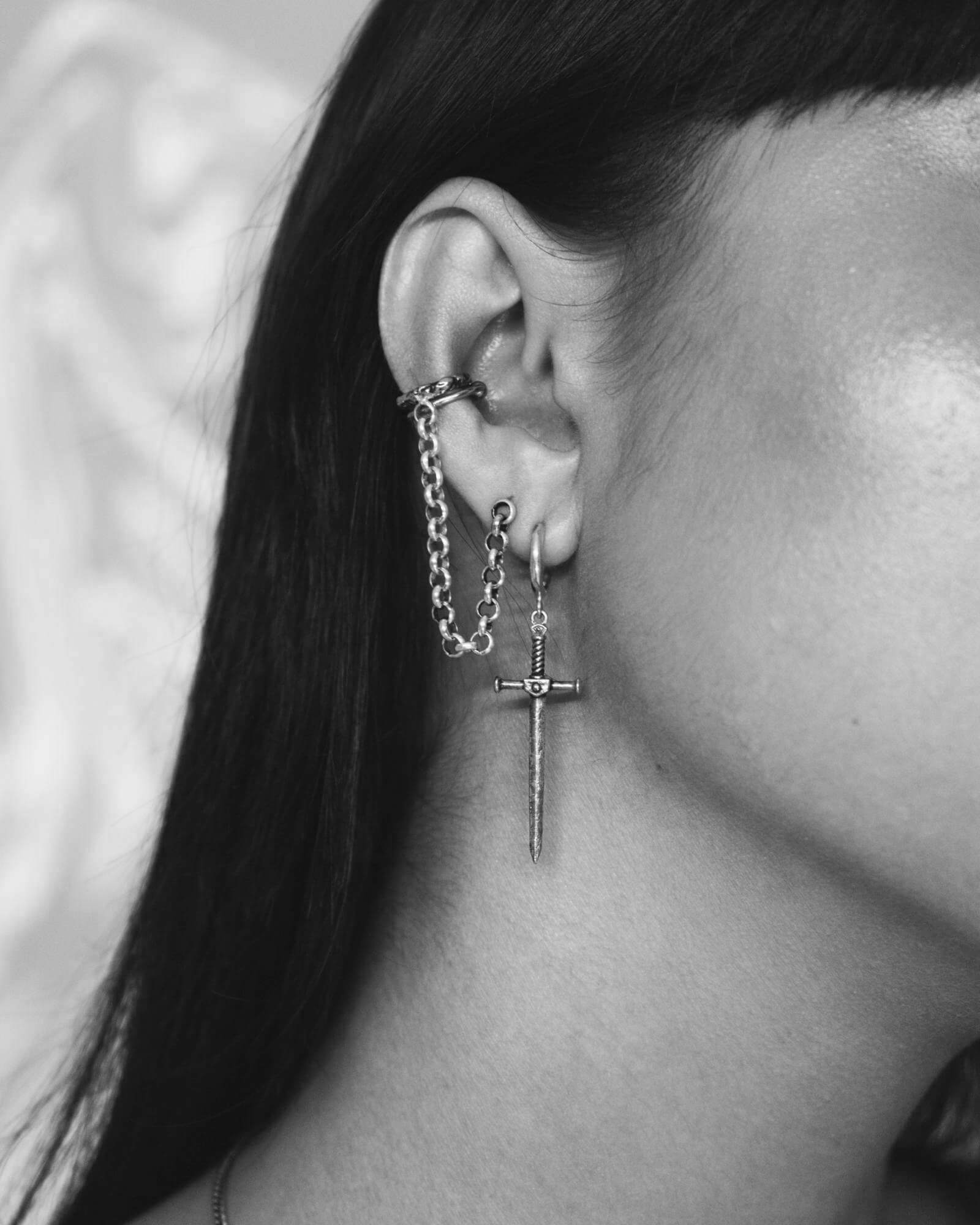 Dangling sword clearance earring